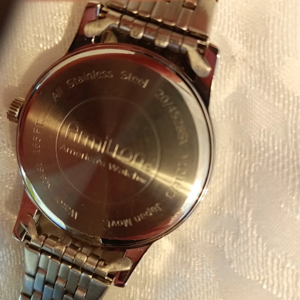 Armitron Unisex watch raised crystal dome face metal silver tone band